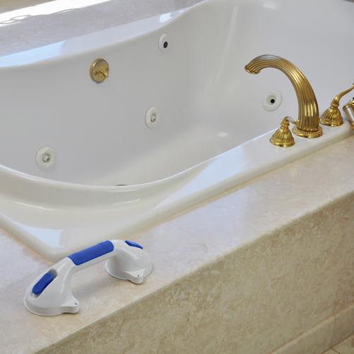 Suction Grab Bar 11.5 L Non-Adjustable installed on bathtub edge for safety and support in bathroom.