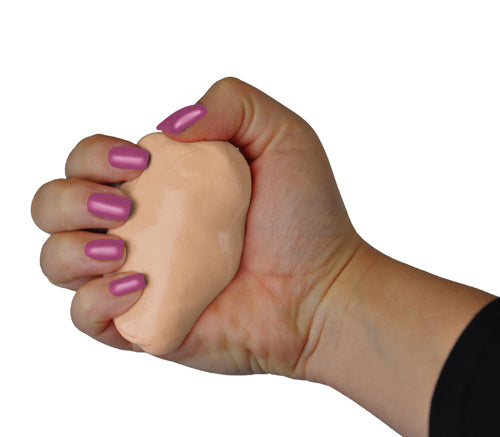 Hand squeezing dark beige Squeeze 4 Strength 2oz Md Soft Hand Therapy Putty for stress relief and hand exercise
