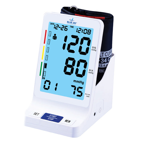 Digital blood pressure monitor with blue backlit screen and black cuff wrapped around device stand