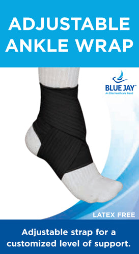 Black adjustable ankle wrap with elastic straps providing customizable support over white sock on foot against white background