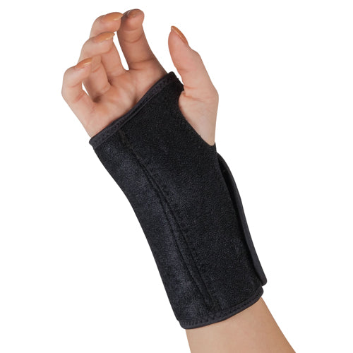 Black wrist brace with reinforced stitching and open thumb design on raised hand against white background