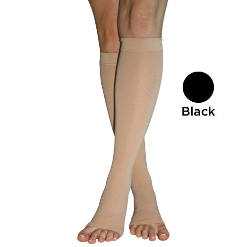 Firm Surg Weight Stkngs 2Xlg 20-30mmHg Below Knee O/T Blk compression stockings in beige shown on legs.