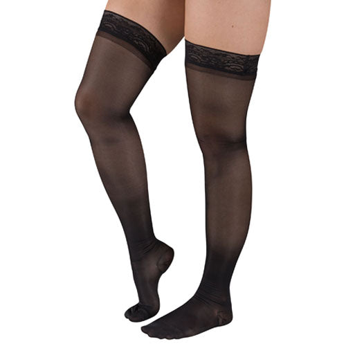 Ladies' Shr Moderate Supprt XL 15-20mmHg Thgh w/StayTop Black compression stockings worn on legs, featuring lace tops for secure fit and moderate support.