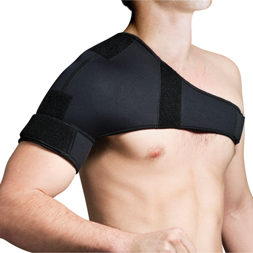 Man wearing black adjustable shoulder support brace fastened around upper arm and across chest