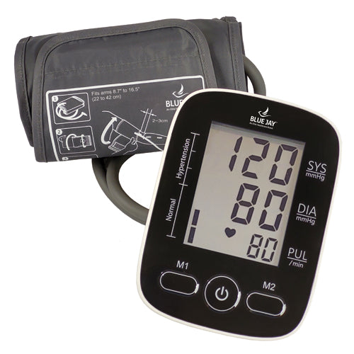 Digital blood pressure monitor with black cuff and large LCD screen showing readings and heart rate indicator